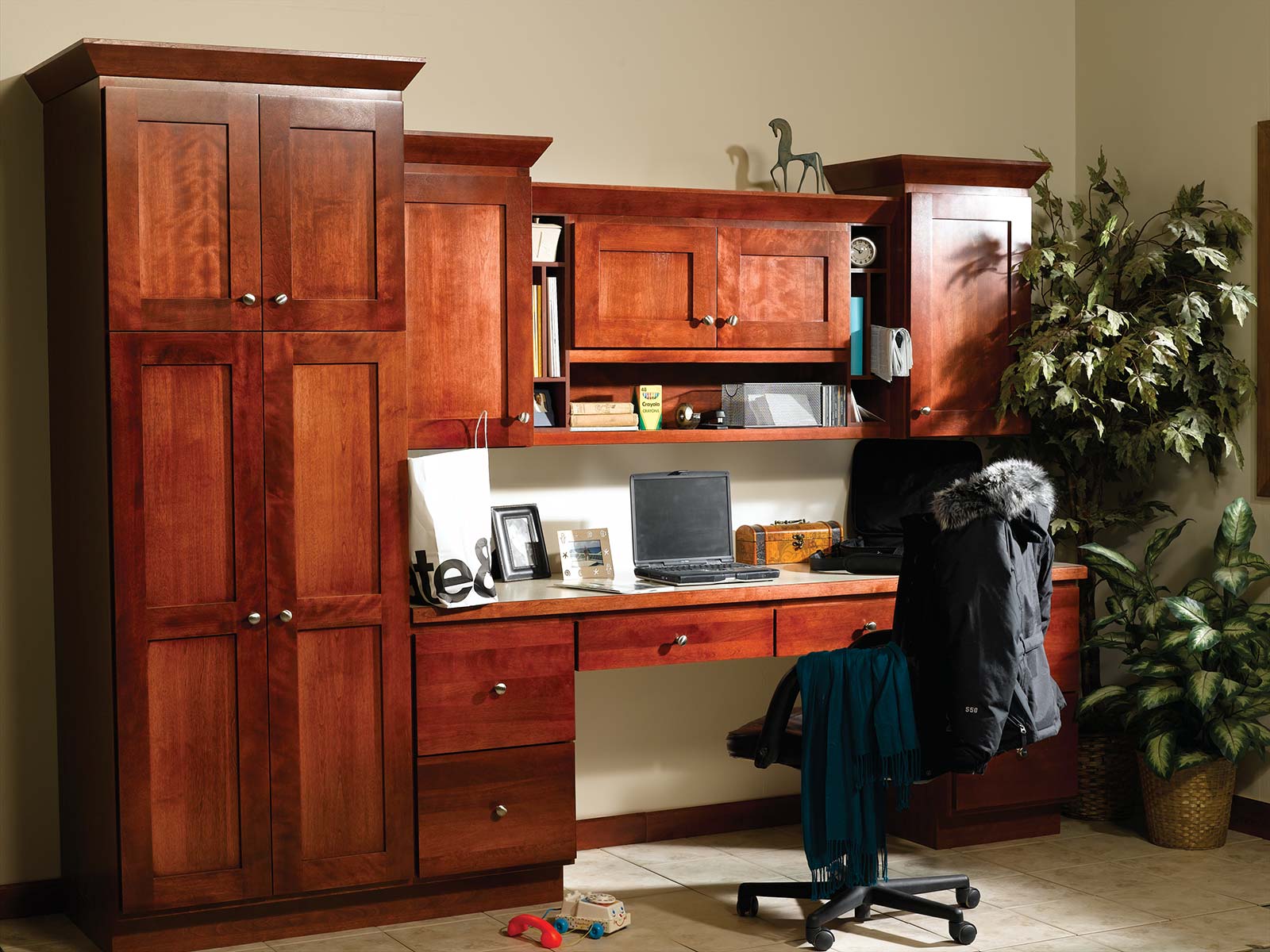 A beautiful home office space with plenty of drawers for organization.