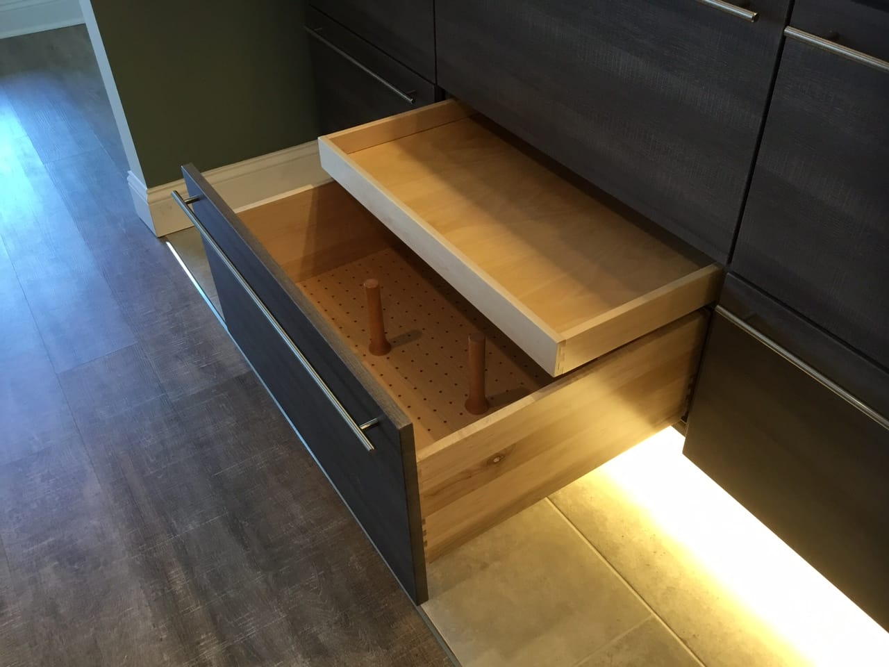 Custom kitchen cabinet drawer with peg dividers