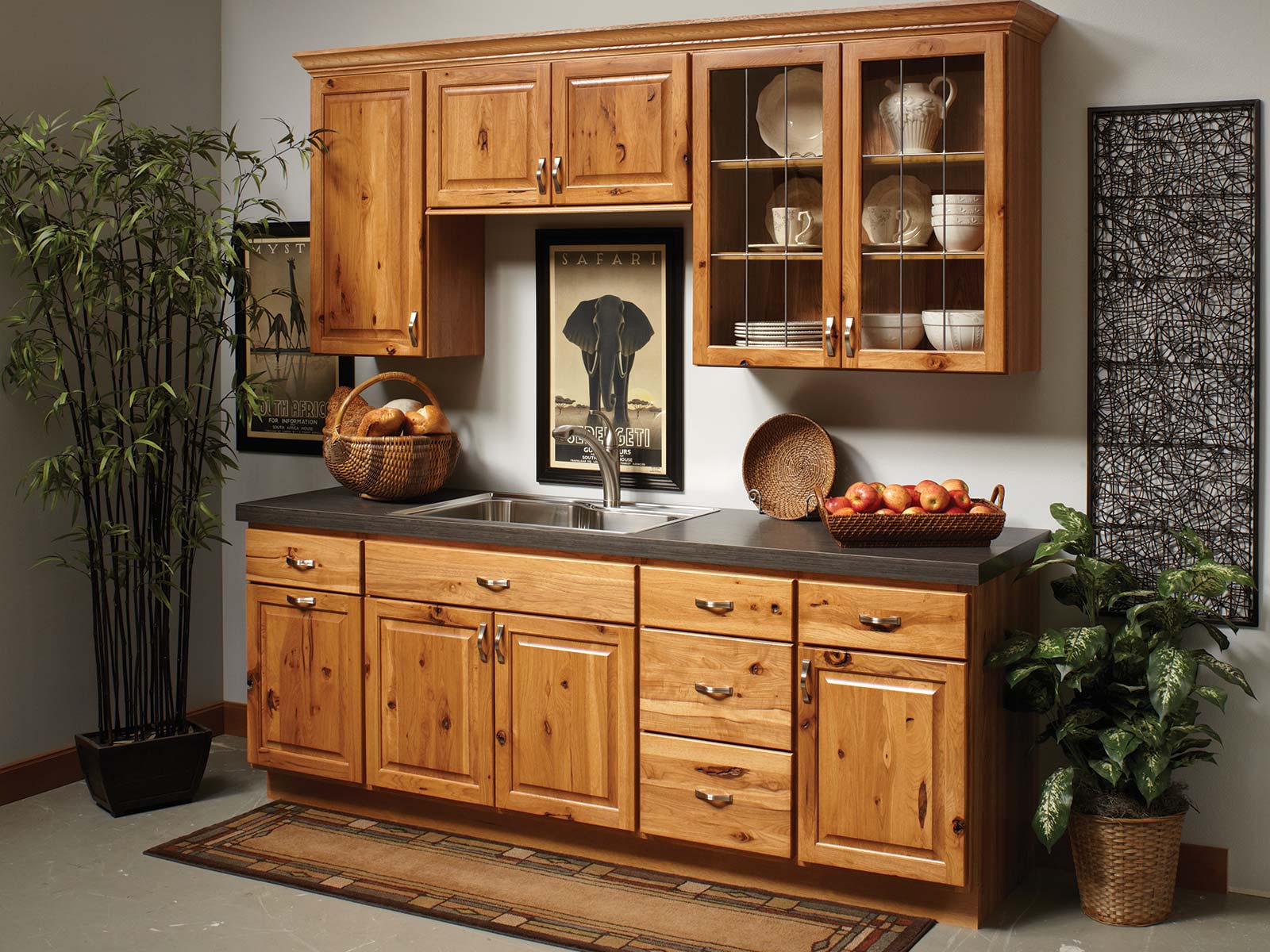 Rustic kitchenette with hickory kitchen cabinets.