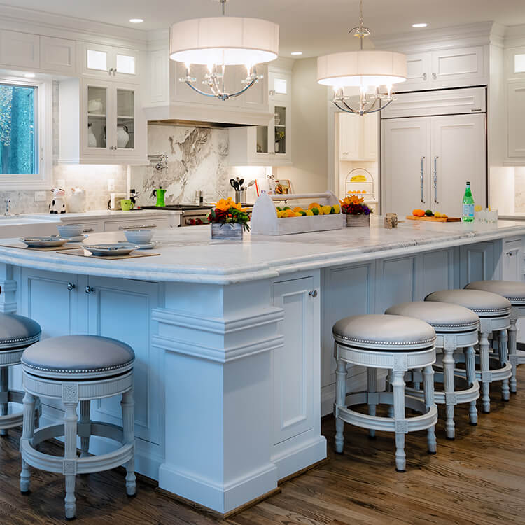 White kitchen with large island and ample seating