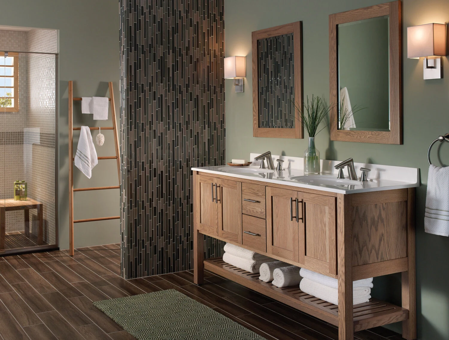 A sleek, transitional style bathroom with a spa-like design featuring a light stained wood vanity with a furniture style and an open shelf below.
