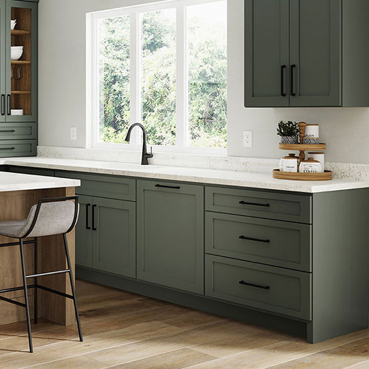 Sage green painted cabinets are a a hot design trend.