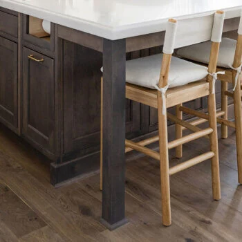 A standard, 3 inch turned post detail with a slim column like look from Bertch Cabinet.