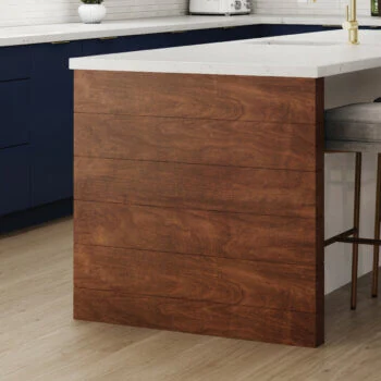 A kitchen island box end cap from Bertch with shiplap panels in a stained finish.