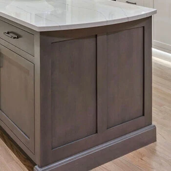 A decorative kitchen island box end with panel details made to match the cabinet door style.