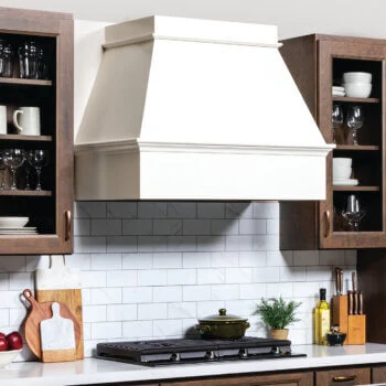 An independent wood hood with a flared canopy.