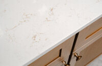 Bertch's much anticipated reeded door style, Reedlyn, shown in Cashew stain on Cherry wood.