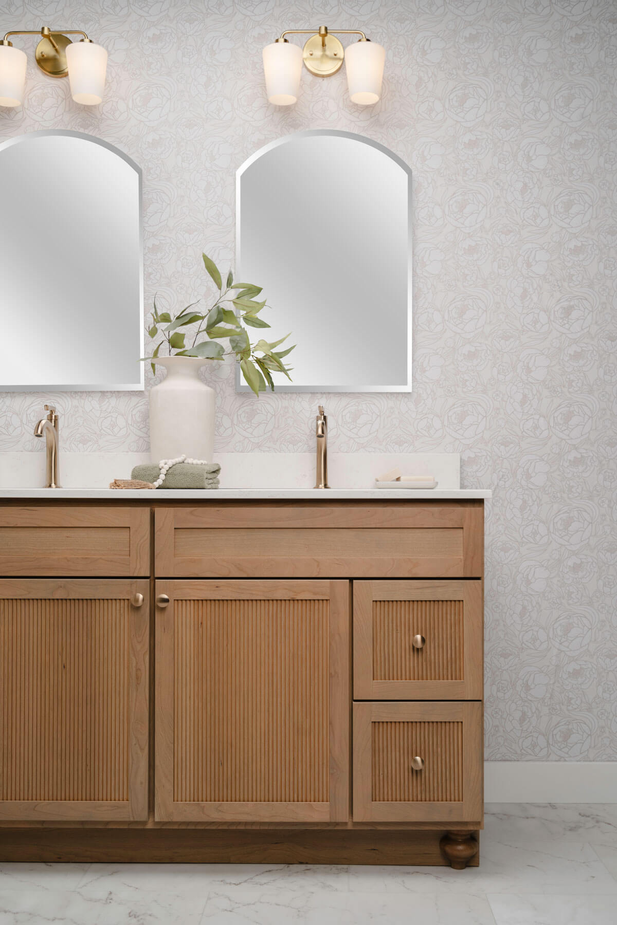 trendy reeded door panels add texture and depth to this vanity