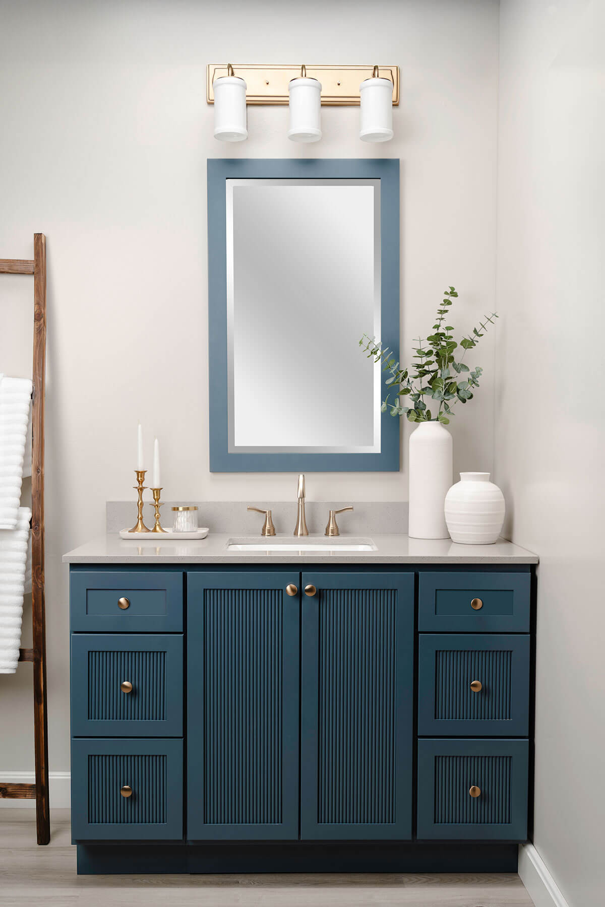 trendy reeded door panels add texture and depth to this vanity